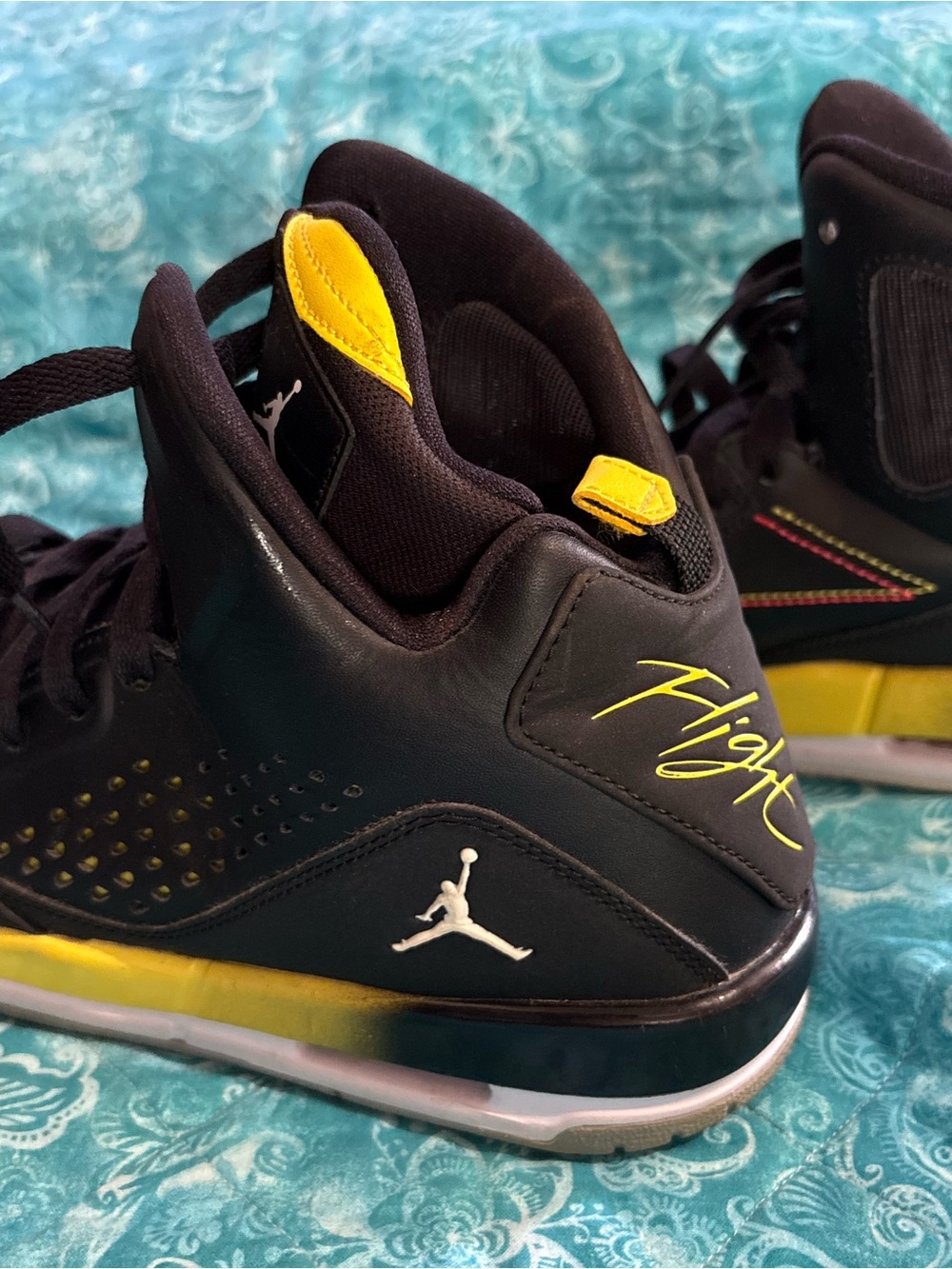 Air Jordan 'Flight' Black and Yellow High-Top Sneakers